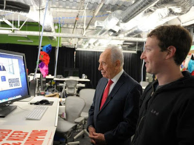 Picture of Mark Zuckerberg at desk