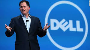 Picture of Michael Dell in front of Dell Logo